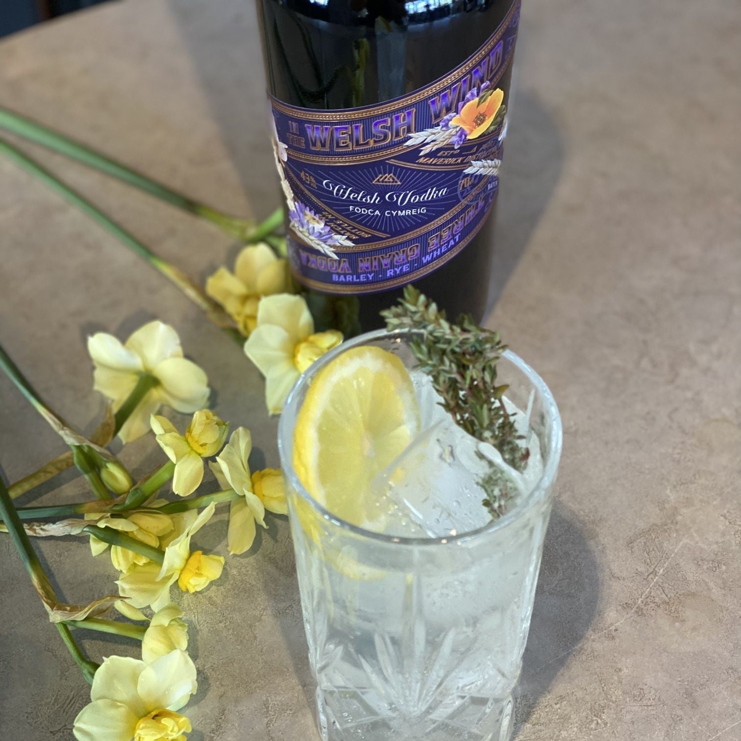 A spring blossom Collins cocktail made with In the Welsh Wind gin