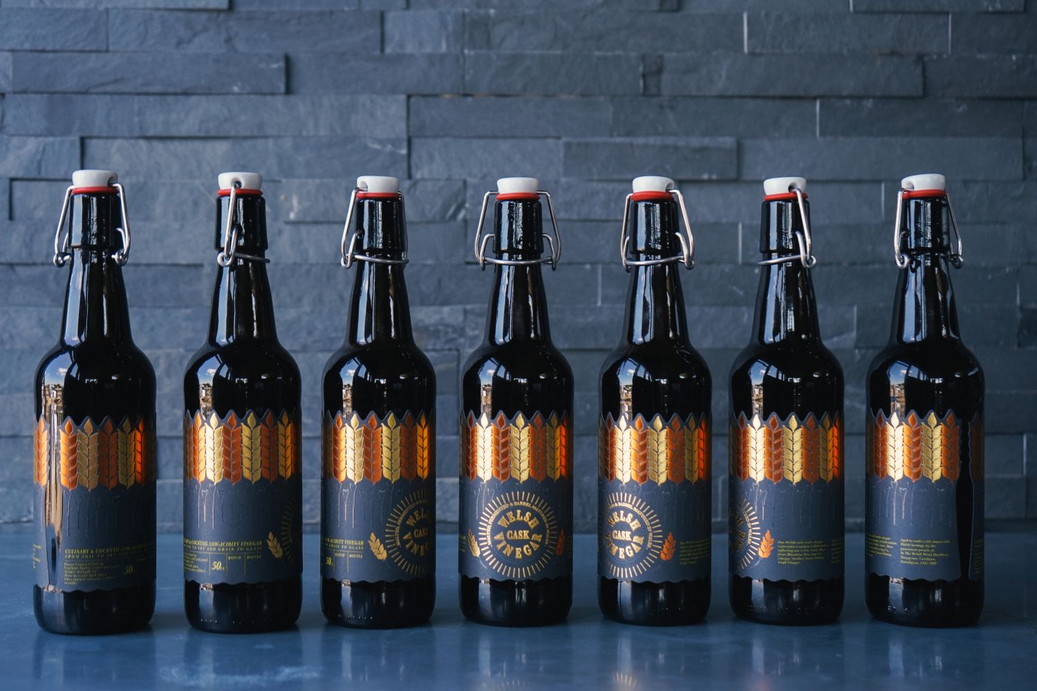 A row of In the Welsh Wind Welsh cask vinegar bottles