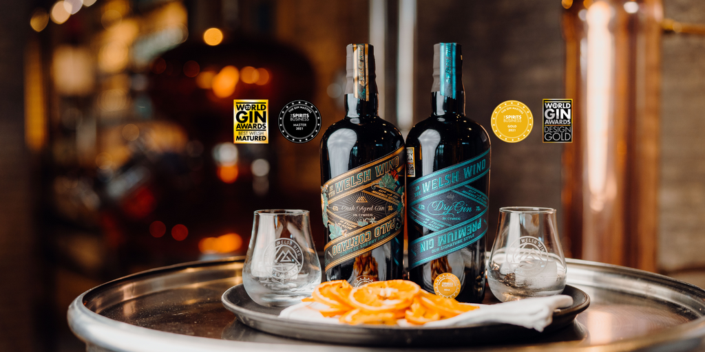 A display of award-winning Welsh Gin at In The Welsh Wind Distillery - Signature Style Gin and Limited Edition Palo Cortado Cask Aged Gin.